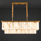 Two-Tier Linear Alabaster Chandelier with Brass Frame on a dark charcoal grey studio ceiling backdrop