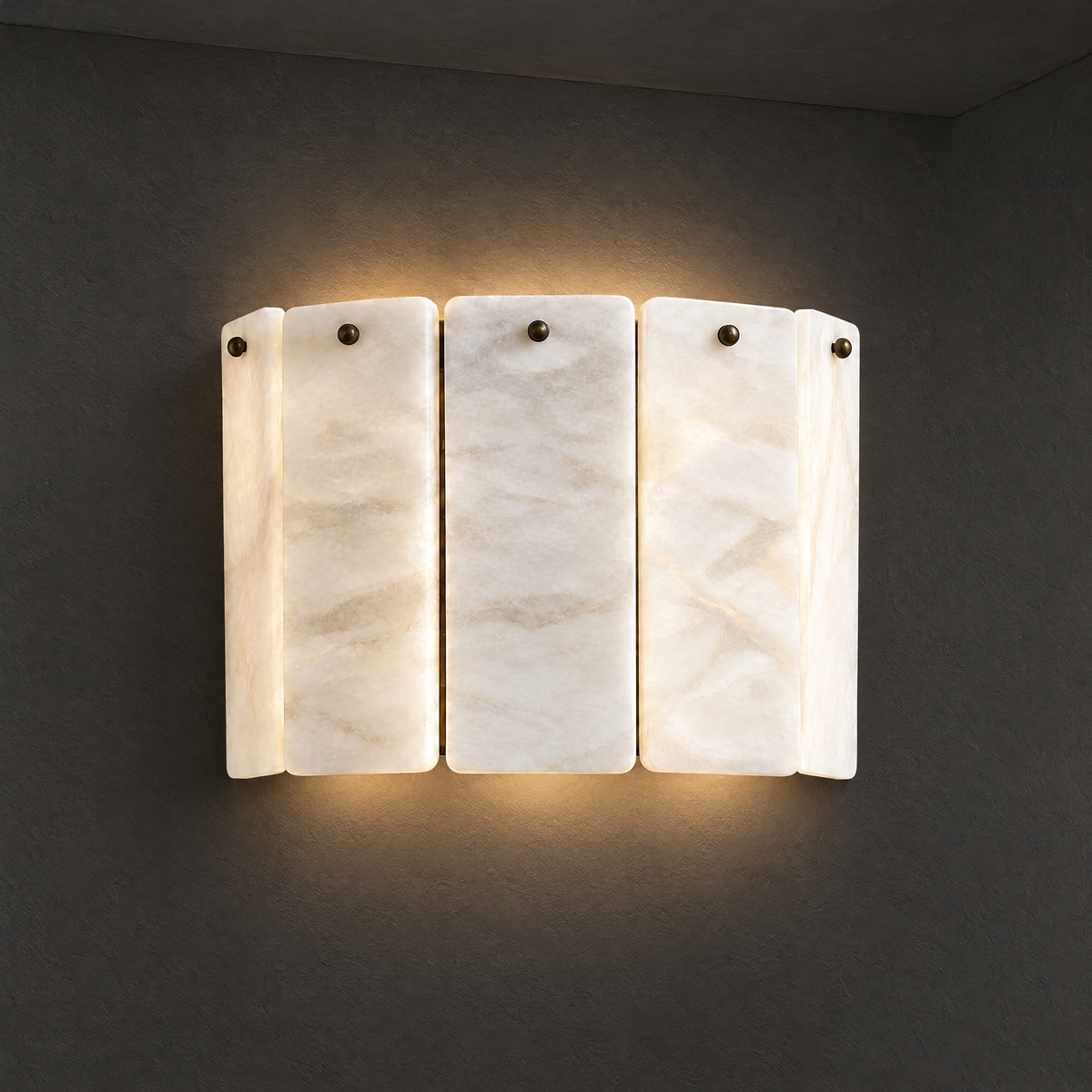 Layered Alabaster Wall Sconce on a dark charcoal grey studio wall backdrop