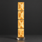 Amber Glass Panel Floor Lamp on a dark charcoal grey studio backdrop