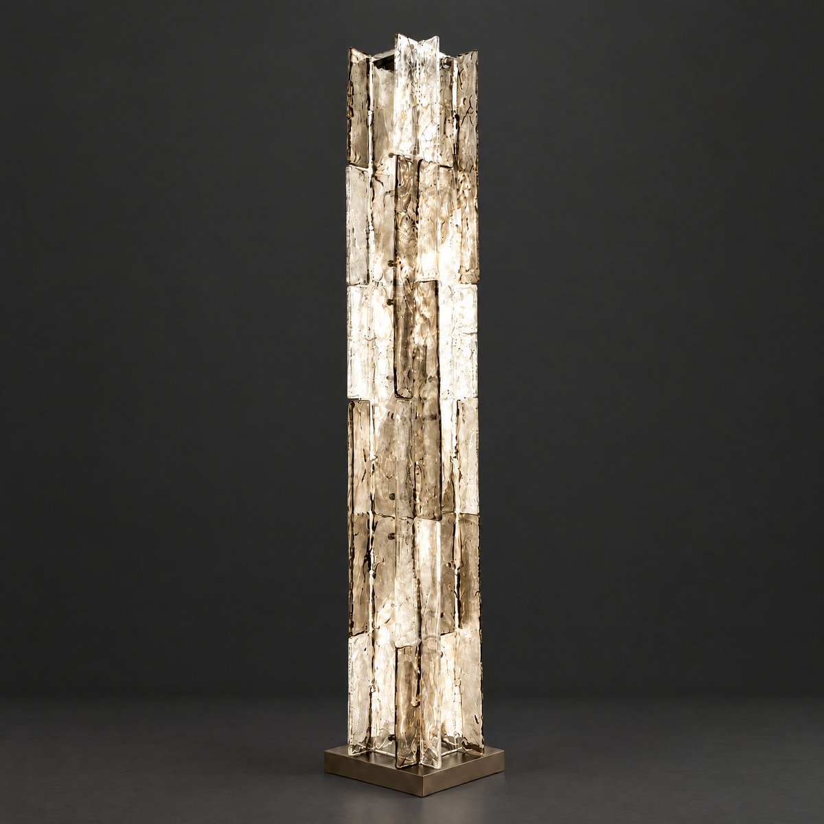 Smoked Textured Glass Column Floor Lamp on a dark charcoal grey studio backdrop