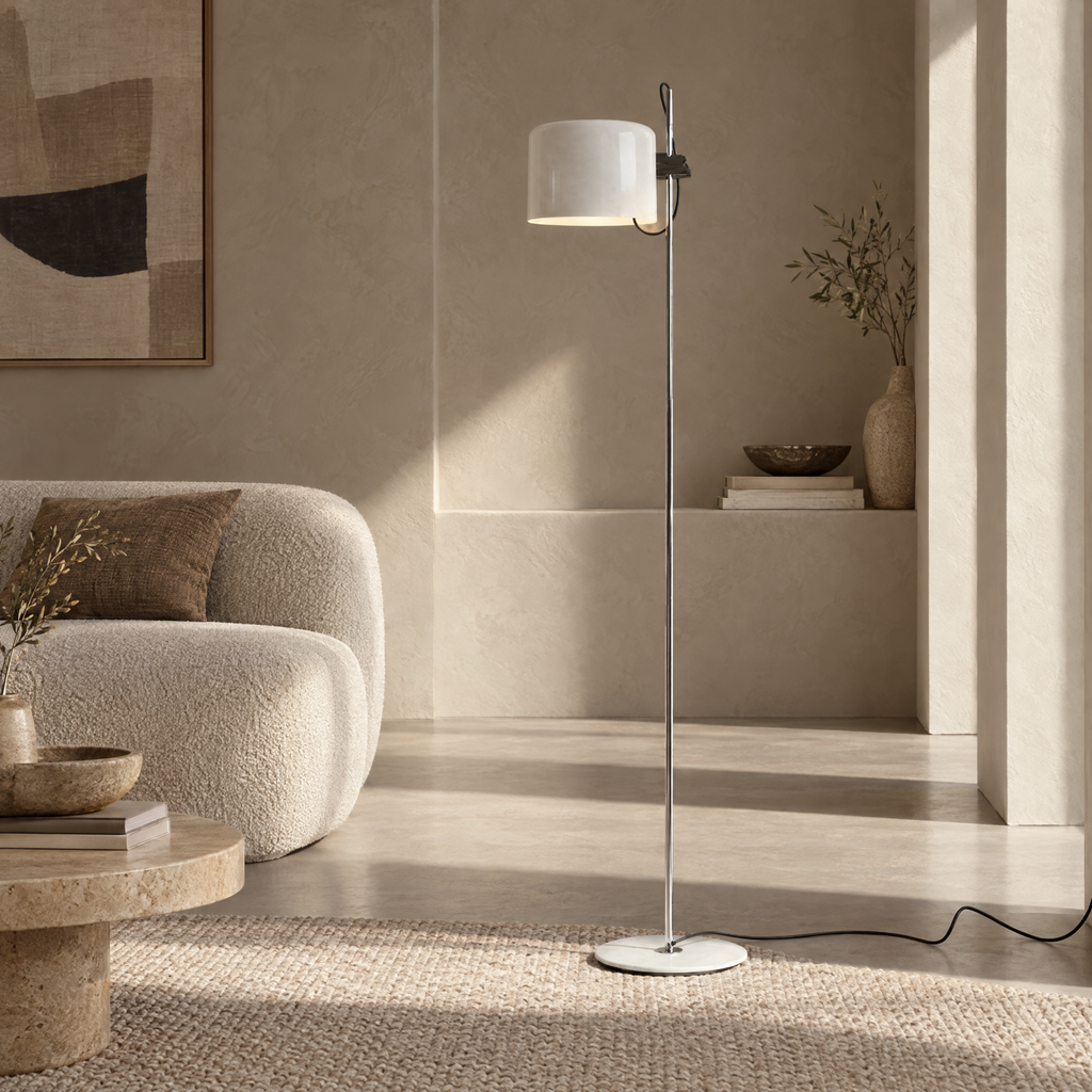 Adjustable Black Arc Floor Lamp in a styled room setting