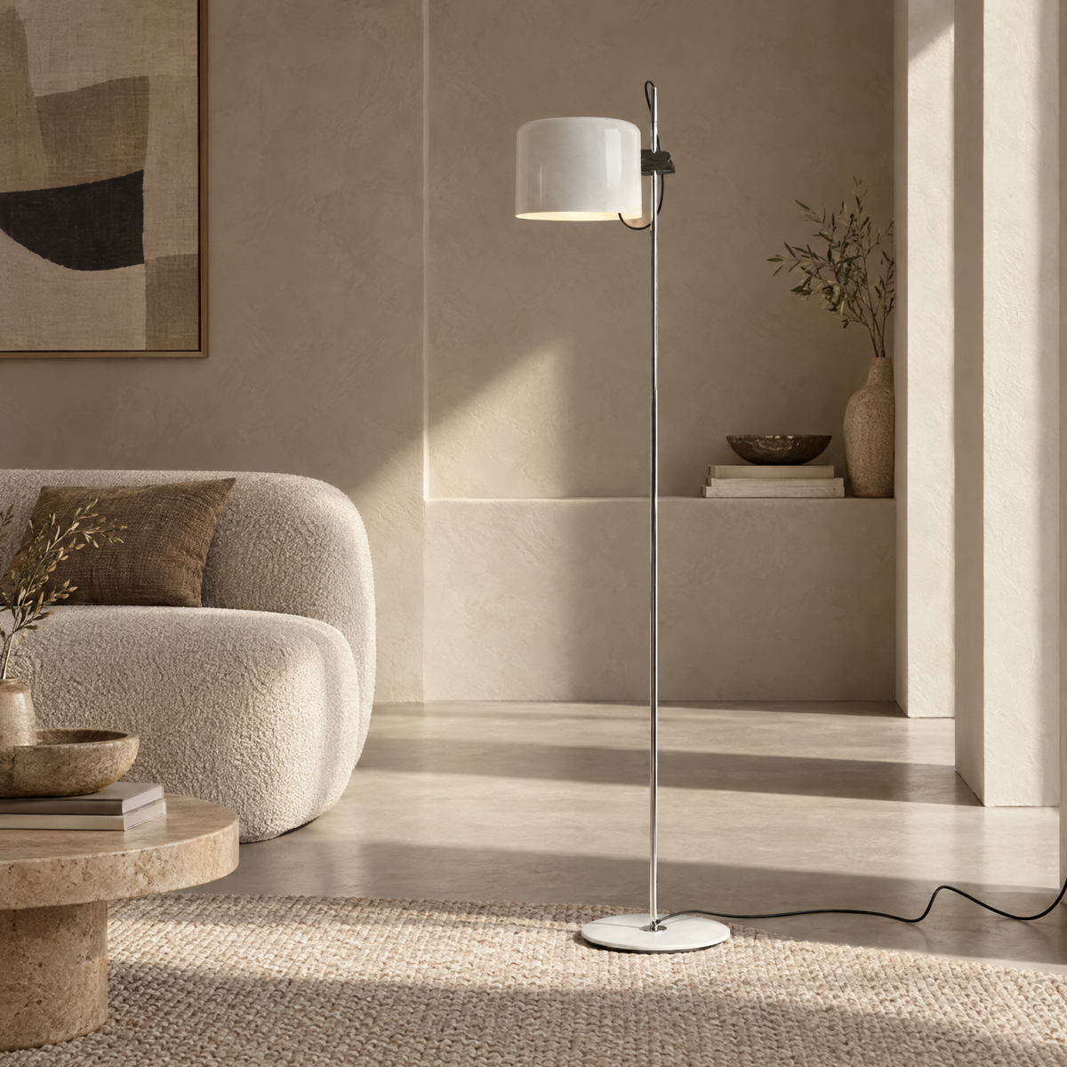 Adjustable Black Arc Floor Lamp in a styled room setting
