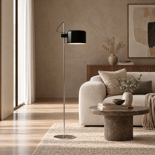 Adjustable Black Arc Floor Lamp in a styled room setting