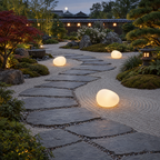 Solar Pebble Stone Garden Lights in a styled outdoor setting