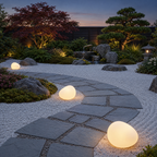 Solar Pebble Stone Garden Lights in a styled outdoor setting