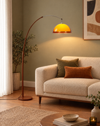 Adjustable Arc Floor Lamp with Warm Dome Shade in a styled room setting