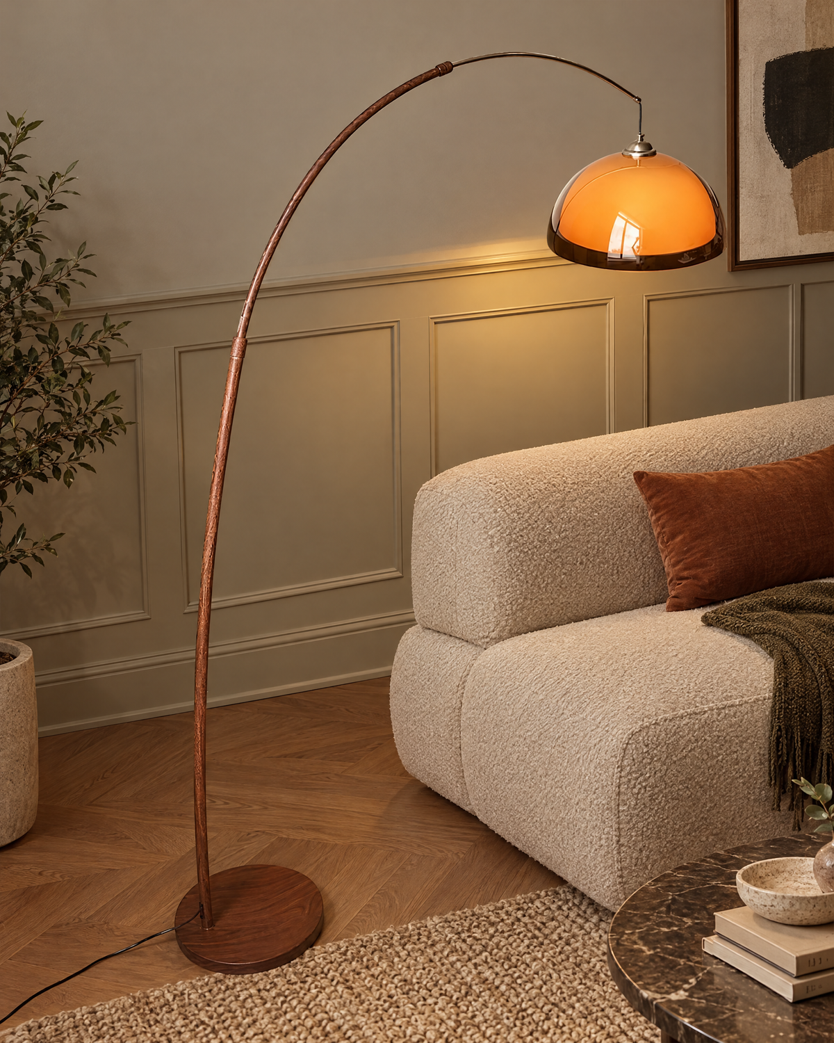 Adjustable Arc Floor Lamp with Warm Dome Shade in a styled room setting