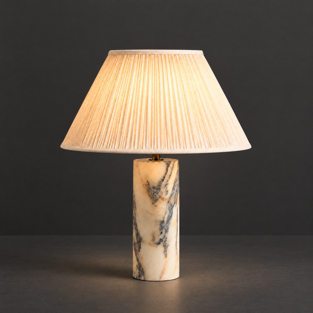 Grey Marble Table Lamp with Pleated Shade on a dark charcoal grey studio backdrop