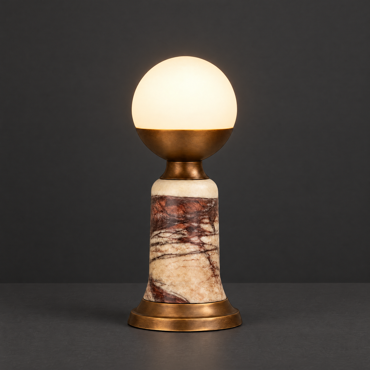 Red Marble Table Lamp with Opaline Globe on a dark charcoal grey studio backdrop