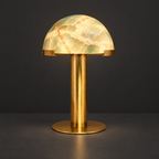 Green Onyx Dome Table Lamp with Brass Base on a dark charcoal grey studio backdrop