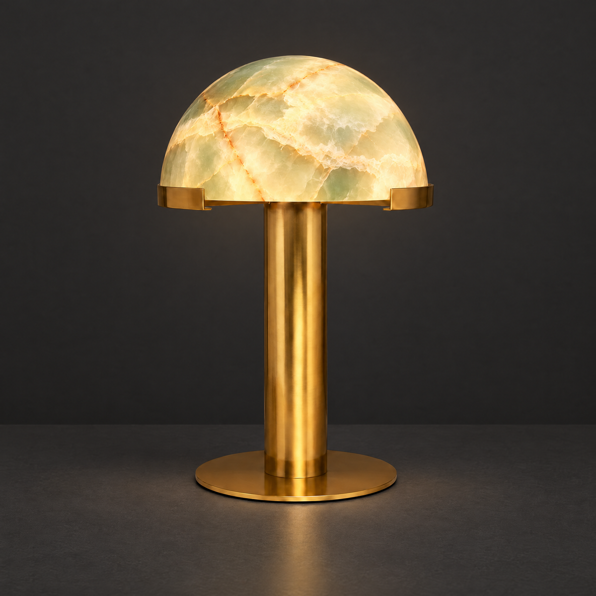 Green Onyx Dome Table Lamp with Brass Base on a dark charcoal grey studio backdrop