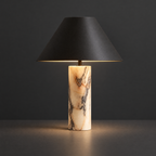Marble Column Table Lamp with Black Cone Shade on a dark charcoal grey studio backdrop