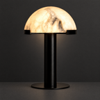 Alabaster Dome Table Lamp with Black Column on a dark charcoal grey studio backdrop