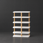 Minimalist PVC and Wood Shoe Rack on a dark charcoal grey studio backdrop