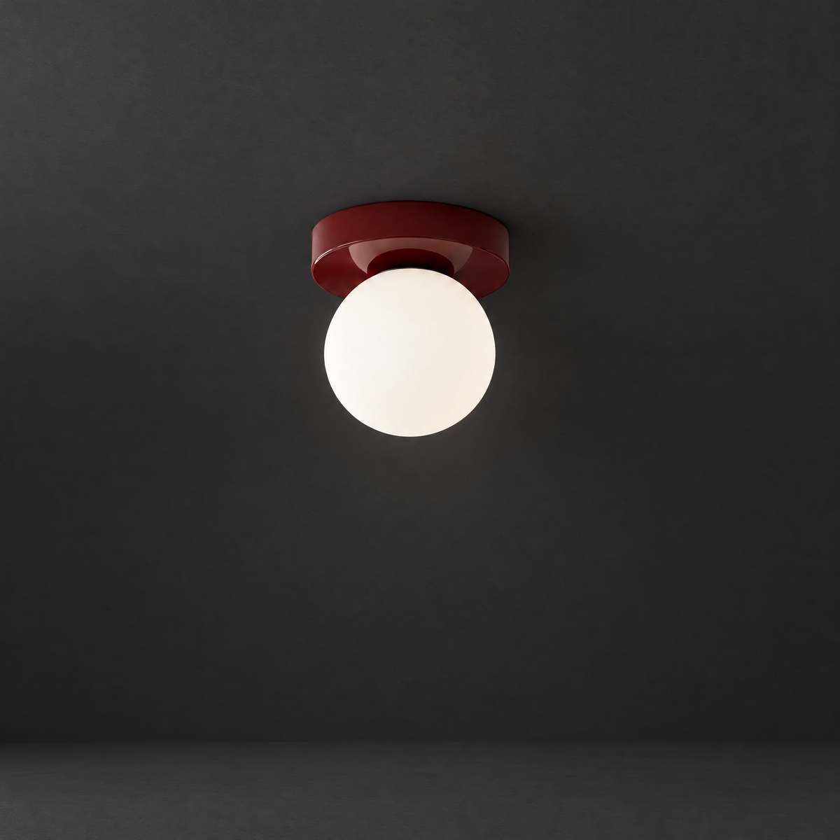 Frosted Glass Globe Wall Sconce on a dark charcoal grey studio backdrop