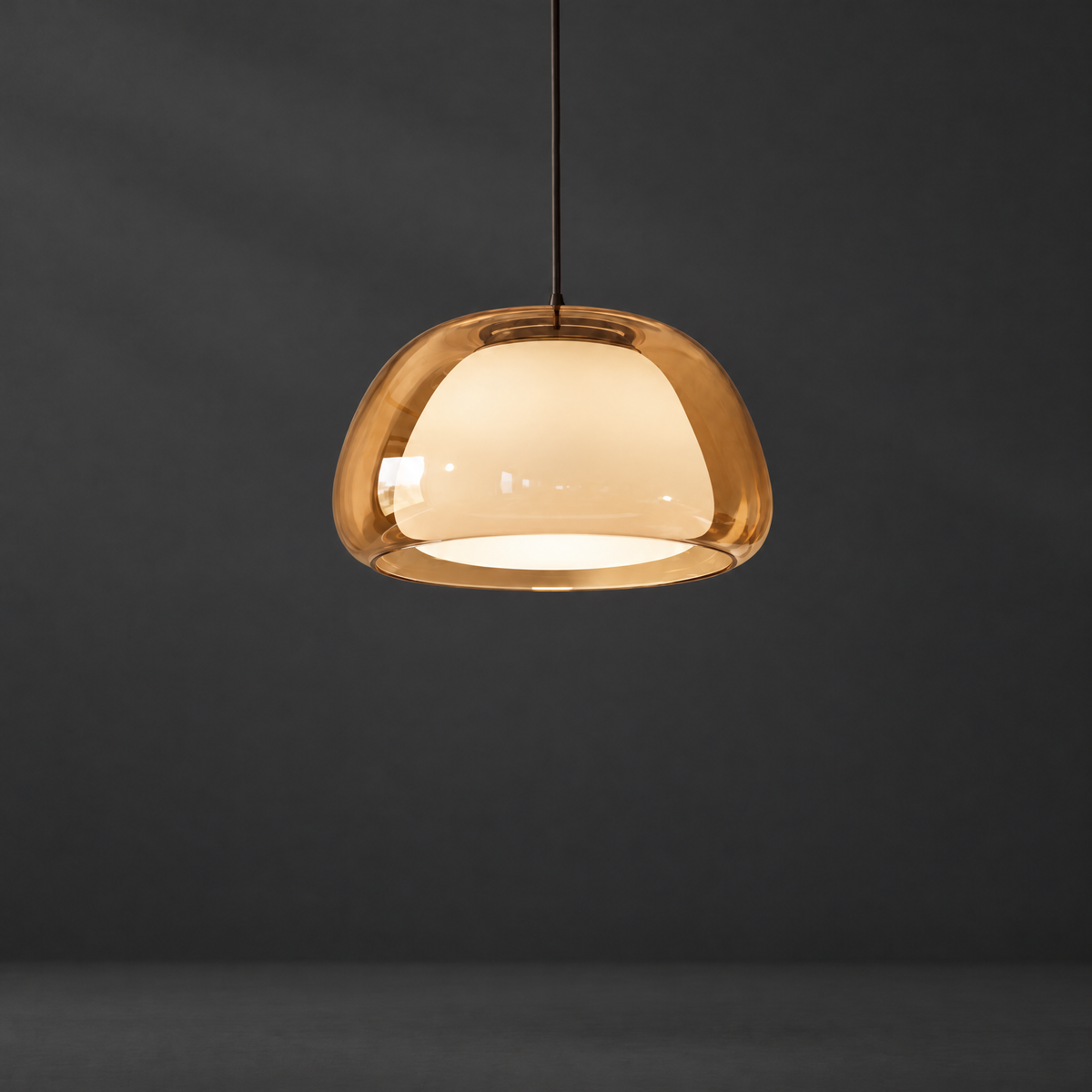 Glass Dome Pendant Light on a dark charcoal grey studio backdrop
