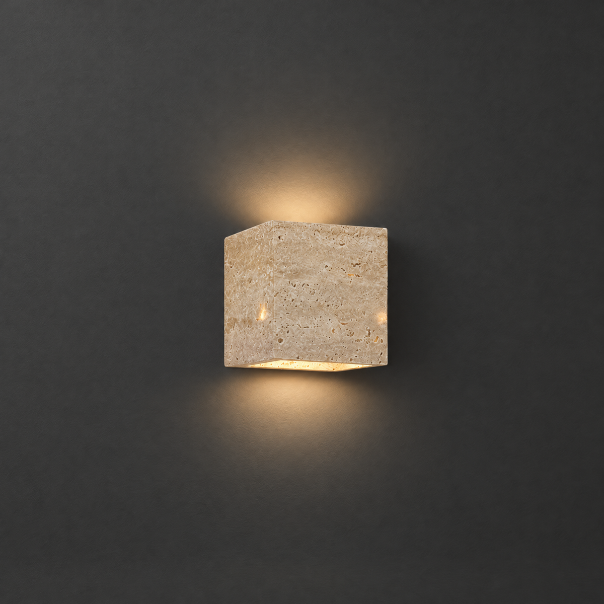 Travertine Wall Sconce for Indoor and Outdoor on a dark charcoal grey studio backdrop